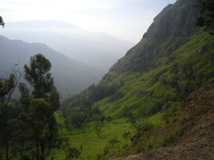 Green mountains on Main Line of train in Sri Lanka